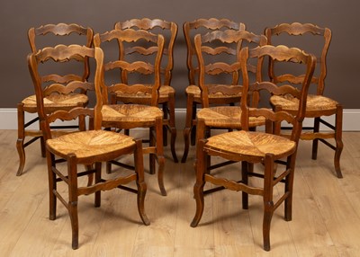 Lot 107 - A set of eight fruitwood farmhouse chairs