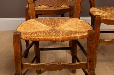 Lot 107 - A set of eight fruitwood farmhouse chairs