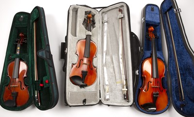 Lot 559 - A collection of six modern violins, various...