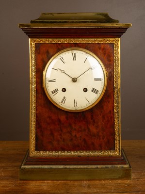 Lot 62 - A 19th century mantel clock in plum pudding mahogany with gilt ormolu mounts