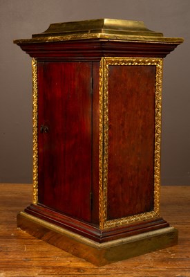 Lot 62 - A 19th century mantel clock in plum pudding mahogany with gilt ormolu mounts