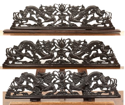 Lot 478 - Three hardwood, possibly Zitan carved mounts...