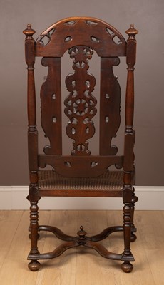 Lot 142 - A 17th century style walnut open armchair