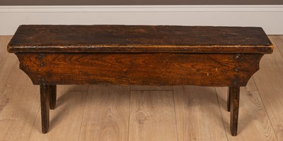 Lot 123 - A single plank elm sword chest
