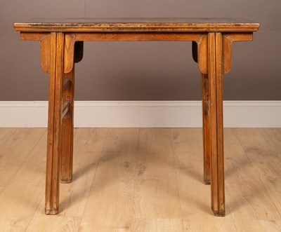 Lot 254 - A Chinese elm topped side table