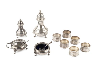 Lot 730 - A silver four piece cruet set, of gadrooned...