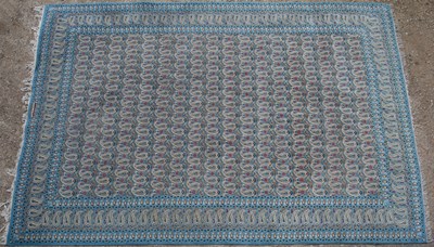 Lot 324 - A blue ground Qum style rug