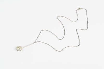 Lot 186 - A diamond single stone pendant on chain, the...