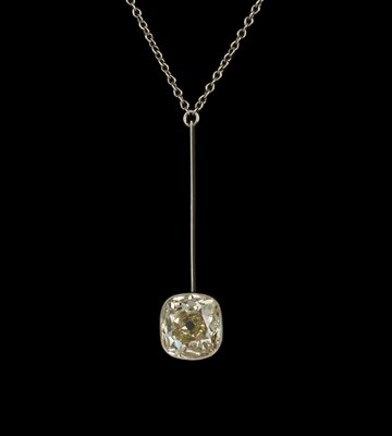 Lot 186 - A diamond single stone pendant on chain, the...