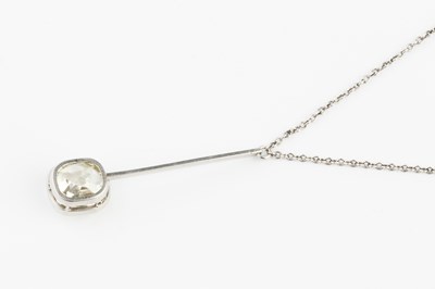 Lot 186 - A diamond single stone pendant on chain, the...