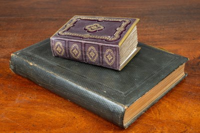 Lot 26 - Two leather bound albums