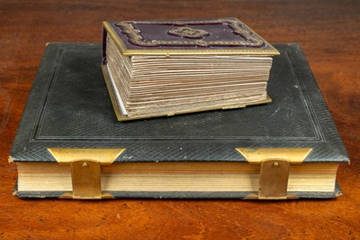 Lot 26 - Two leather bound albums