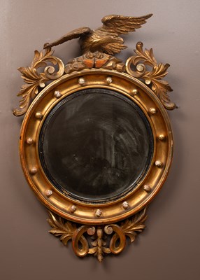 Lot 269 - A giltwood Regency style circular wall mirror