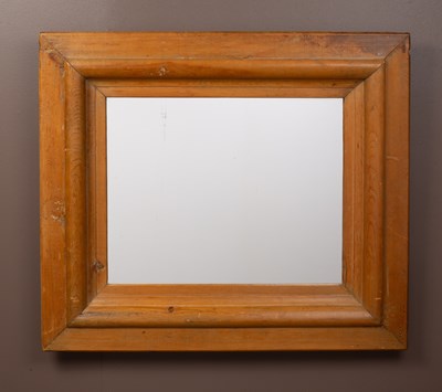 Lot 465 - A pine framed wall mirror