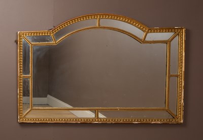 Lot 310 - An Adams style wall mirror