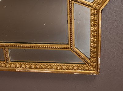 Lot 310 - An Adams style wall mirror