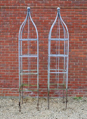 Lot 1256 - A pair of galvanised wrought iron rose obelisks