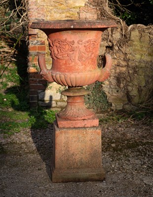 Lot 1291 - A terracotta coloured cast reconstituted stone campana urn