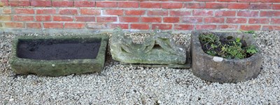 Lot 1262 - An old architectural element together with two stone troughs