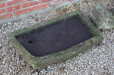 Lot 1262 - An old architectural element together with two stone troughs