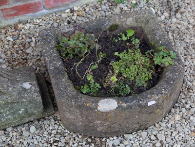 Lot 1262 - An old architectural element together with two stone troughs