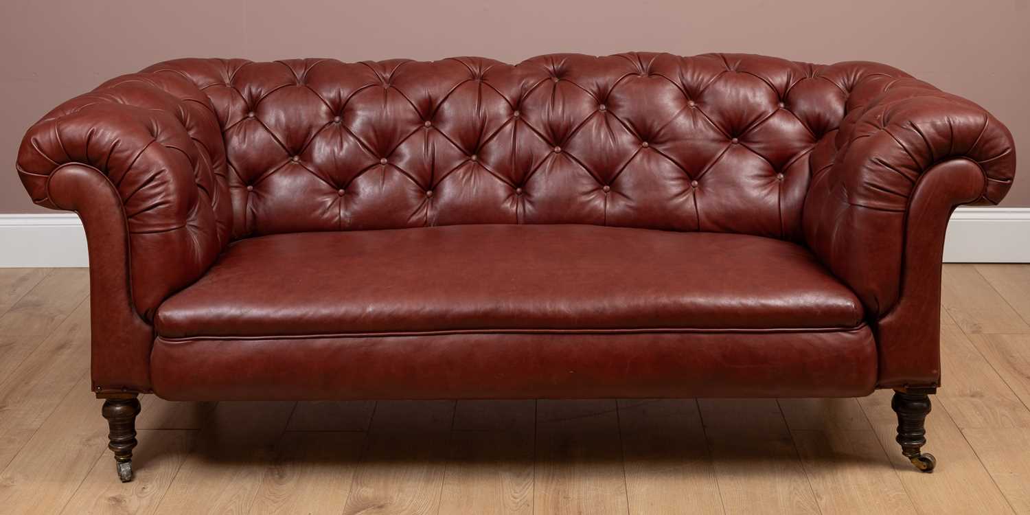 Lot 159 - A leather upholstered button back Chesterfield settee