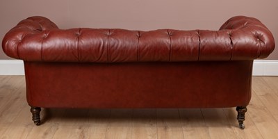 Lot 159 - A leather upholstered button back Chesterfield settee