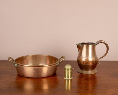 Lot 161 - An antique copper jam pan, an ale jug and a dredger