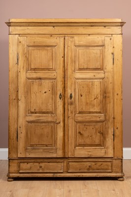 Lot 147 - A late 19th/early 20th century French pine armoire