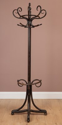 Lot 149 - A black painted bentwood semicircular hall stick stand