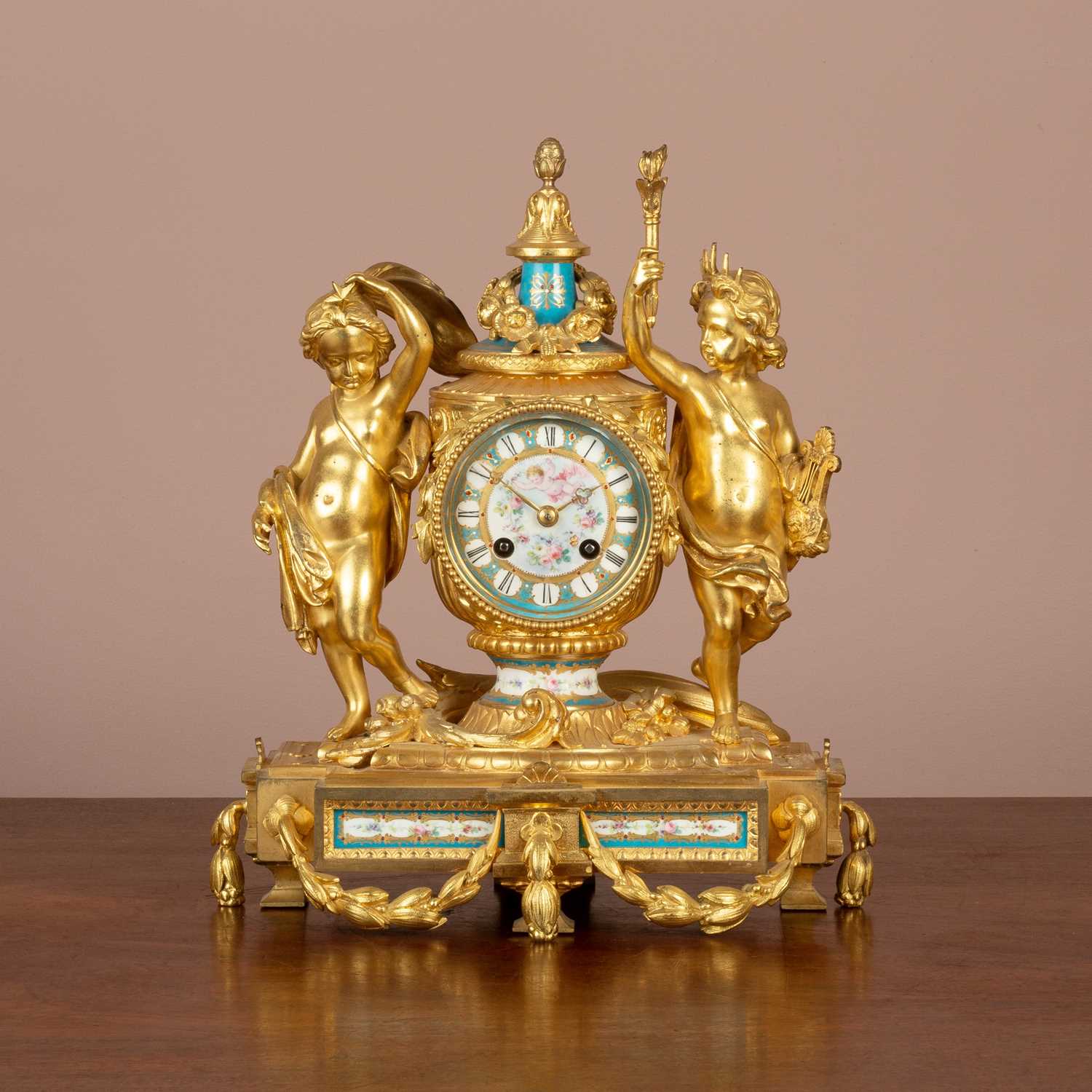 Lot 141 - A French ormolu mantel clock