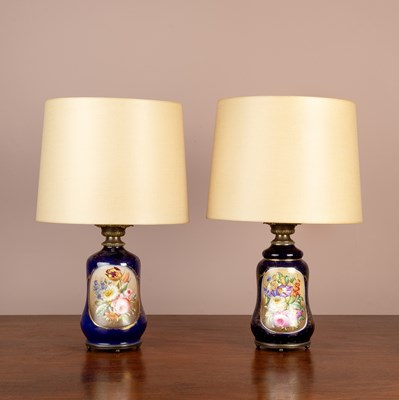 Lot 145 - A pair of continental flower decorated table lamps