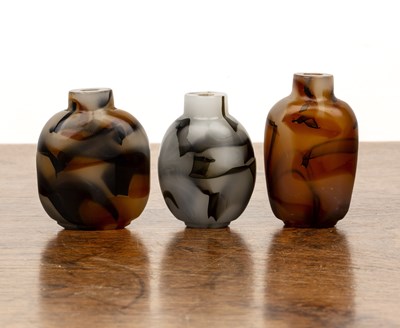 Lot 229 - Three glass snuff bottles Chinese, 1780-1850...