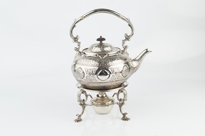 Lot 715 - An Edwardian Scottish silver tea kettle on...