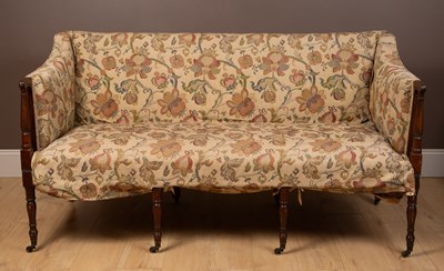 Lot 64 - A Sheraton style mahogany sofa
