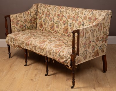 Lot 64 - A Sheraton style mahogany sofa