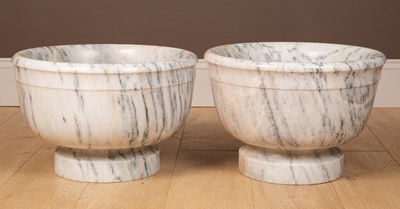 Lot 583 - A pair of turned marble urns