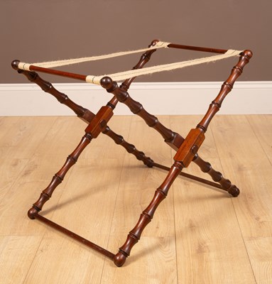 Lot 318 - Three mahogany folding luggage racks