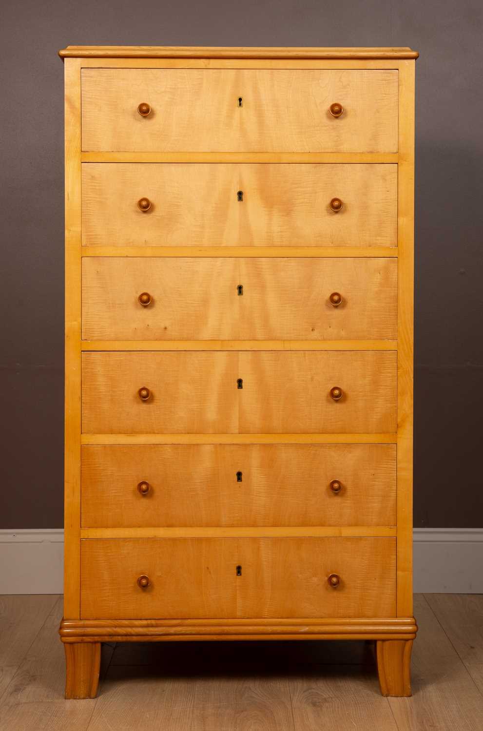 Lot 392 - A Continental satin birch Biedermeier style tall narrow chest of six drawers