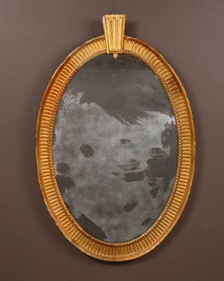 Lot 301 - A George III gilt gesso moulded oval wall mirror