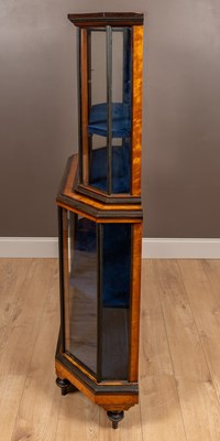 Lot 65 - A two-tier satinwood and ebony banded glazed display cabinet