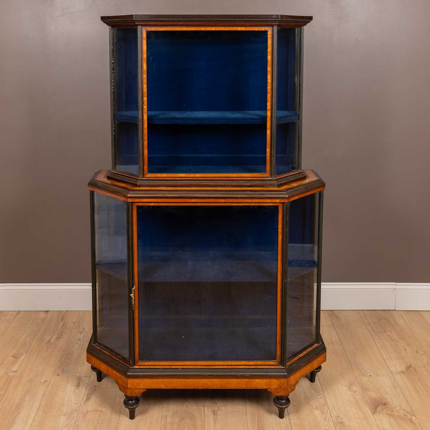Lot 65 - A two-tier satinwood and ebony banded glazed display cabinet