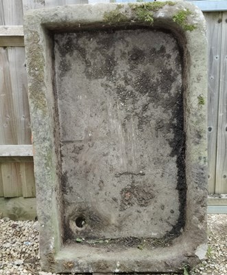 Lot 566 - A large carved limestone sink