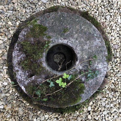 Lot 530 - A grain grinding stone quern