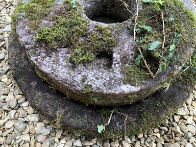 Lot 530 - A grain grinding stone quern