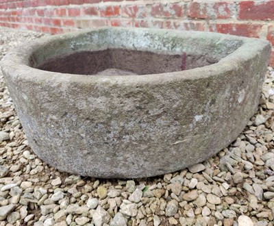 Lot 500 - An old D-shaped stone trough