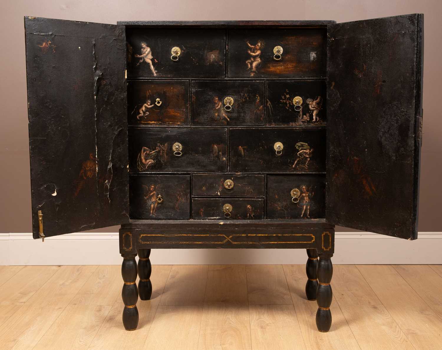 Lot 335 - An 18th century Flemish ebonised collectors cabinet