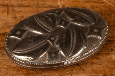 Lot 90 - An early to mid-20th century Arts & Crafts white metal oval snuff box