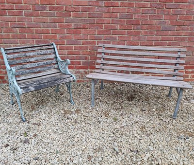 Lot 561 - A cast iron garden chair together with a steel framed garden bench