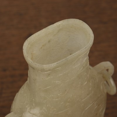 Lot 236 - Pale green jade carved archaic style vase and...